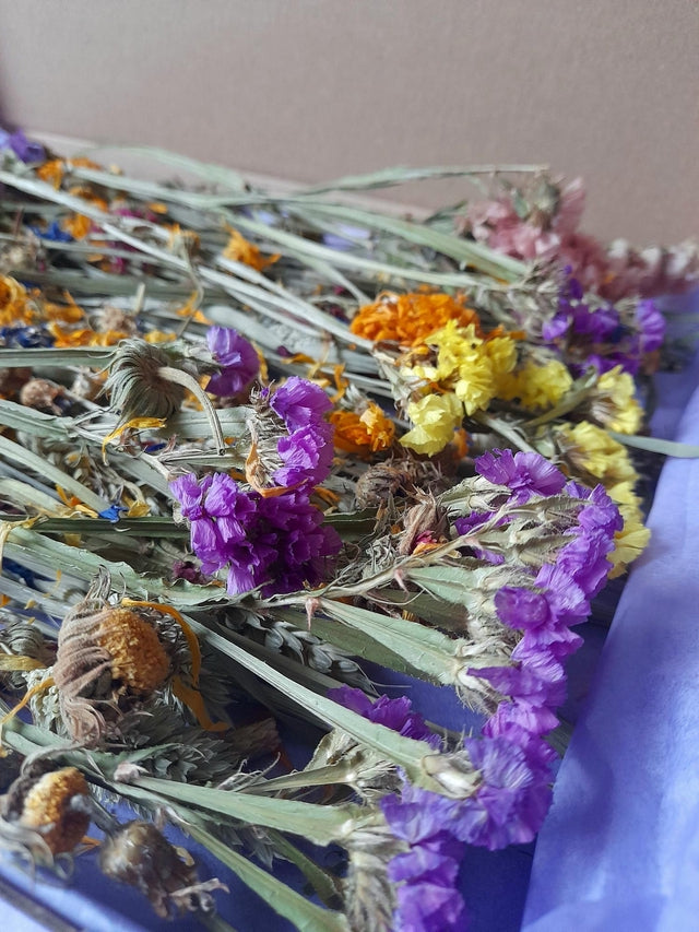 Beautifully crafted bloom boxes filled with dried flowers and natural forage, offering small pets a vibrant and enriching foraging experience