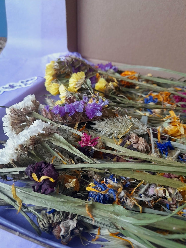 Beautifully crafted bloom boxes filled with dried flowers and natural forage, offering small pets a vibrant and enriching foraging experience